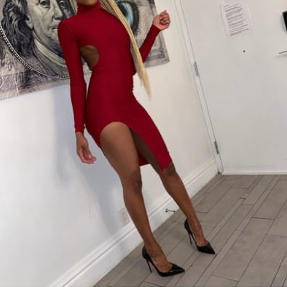 For the DARING!!! Burgundy turtleneck long sleeved back out dress with a split.